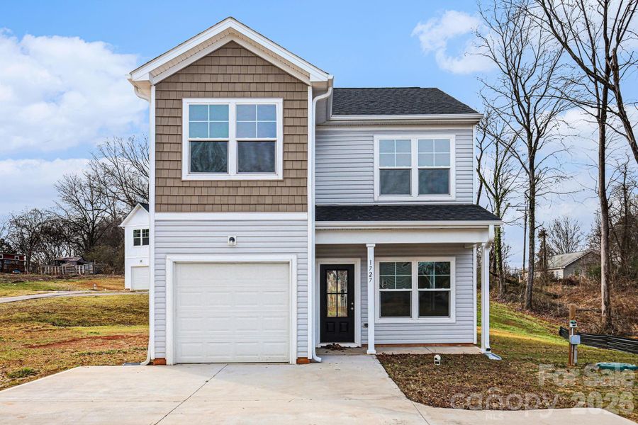 Front exterior of a new home in , Statesville, NC, highlighting curb appeal (Image 1). Front exterior of a new home in , Statesville, NC, highlighting curb appeal (Image 1).