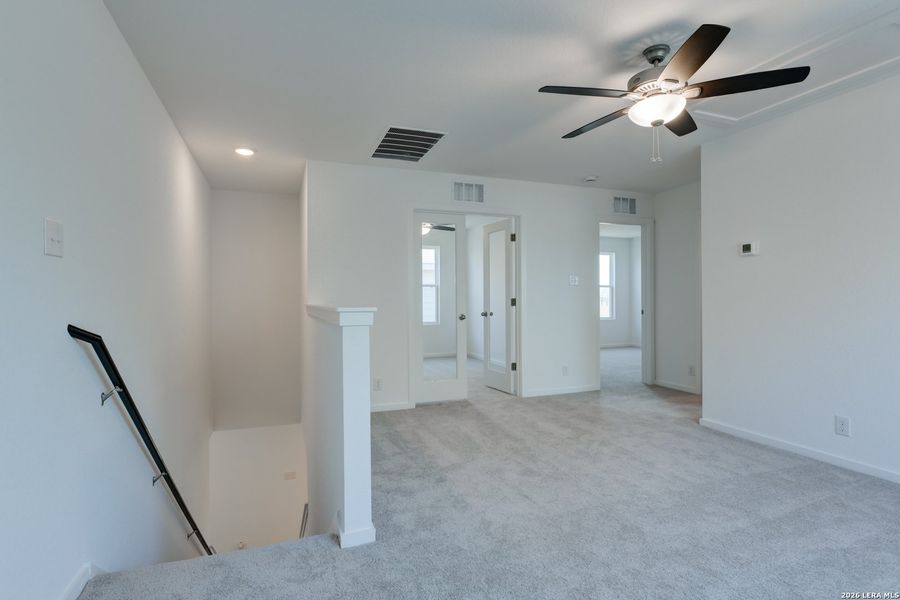 Spacious, unfurnished interior of a new home in Hennersby Hollow, San Antonio (Image 30).