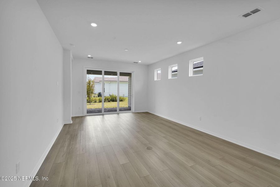 Spacious, unfurnished interior of a new home in Summer Bay at Grand Oaks, St. Augustine (Image 13).