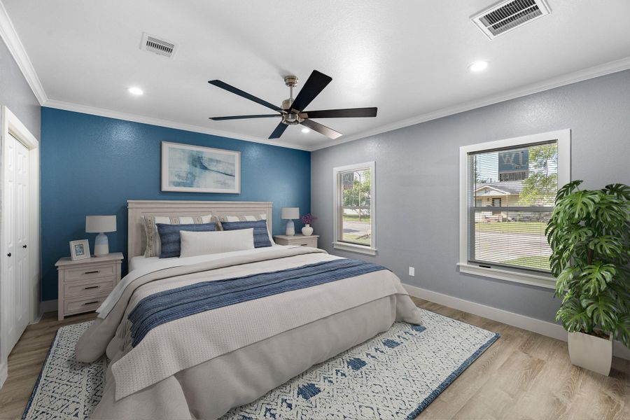 This primary bedroom is an oasis! Big enough for a King size bed and plenty more. *virtually staged*