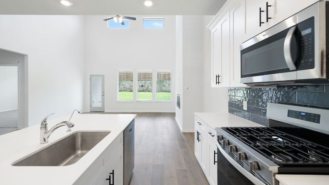 Representative furnished interior of a home built from the Burrow by D.R. Horton in The Landing at Hidden Lakes, McKinney (Image 6).