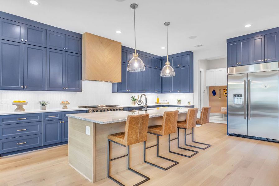 Furnished interior view inside a new home in ARTAVIA, Conroe (Image 6).