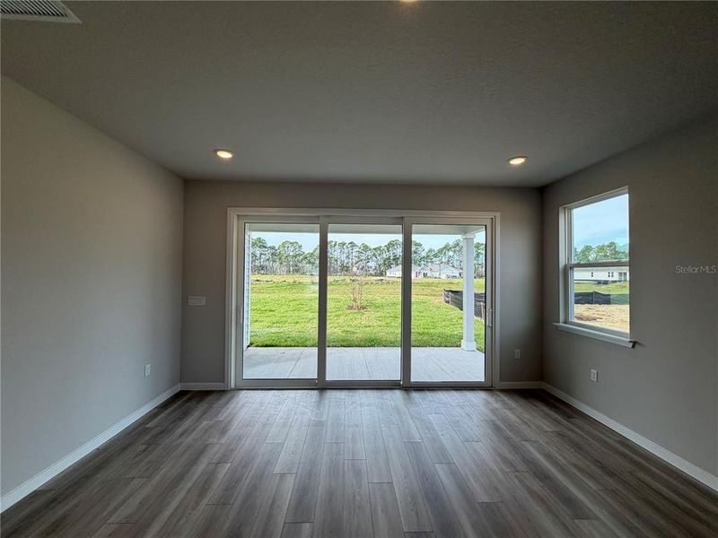 Spacious, unfurnished interior of a new home in The Cypress Series at Reserve East, Flagler Beach (Image 33).
