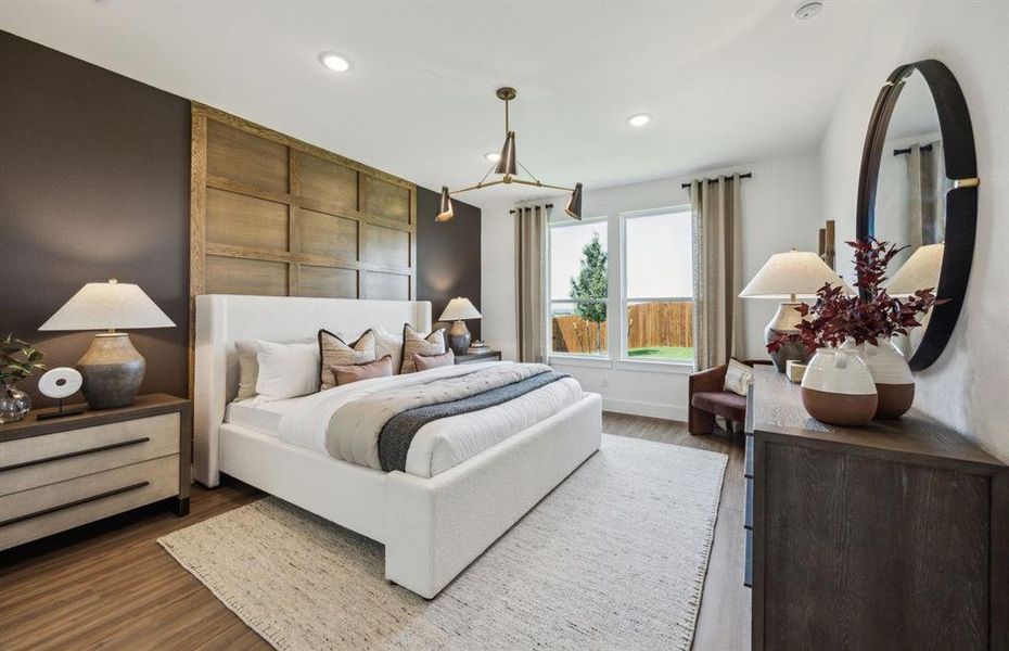 Elegant Owner's suite with beautiful finishes and ample floor space *Model representation