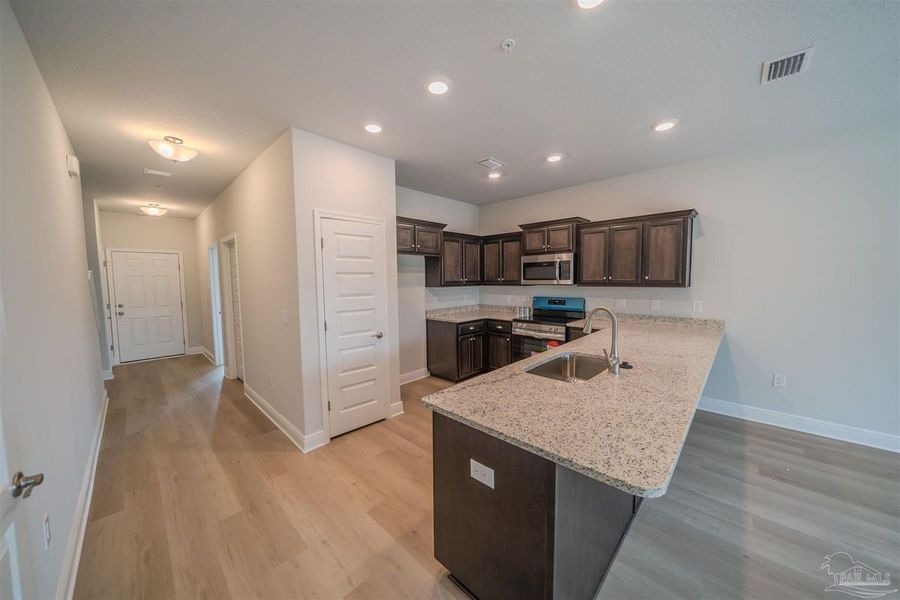 Representative furnished interior of a home built from the Plan 1767 Townhome by Adams Homes in Lexlee Estates, Pensacola (Image 3). Representative furnished interior of a home built from the Plan 1767 Townhome by Adams Homes in Lexlee Estates, Pensacola (Image 3).