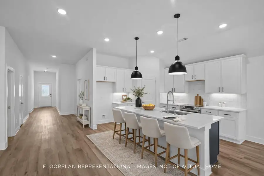 Furnished interior view inside a new home in Pinewood at Grand Texas, New Caney (Image 5).