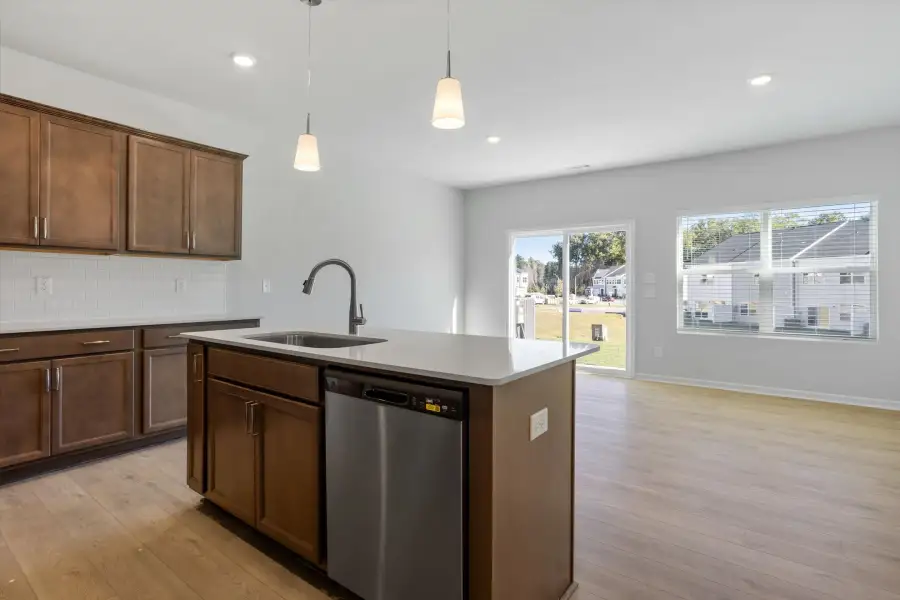 Furnished interior view inside a new home in West Main Townhomes, Sanford (Image 4).
