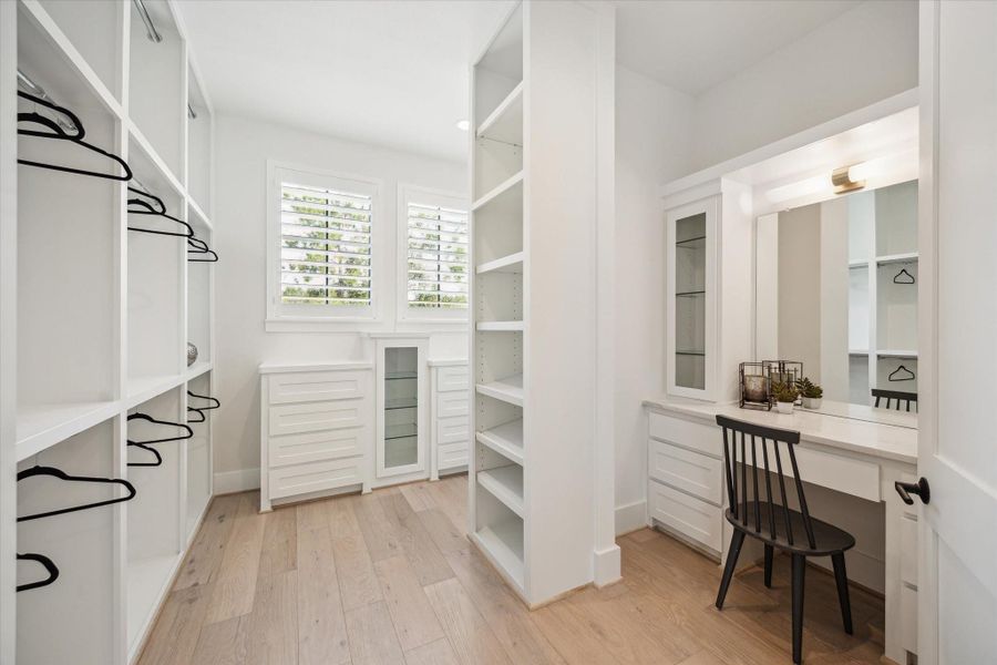 Extremely spacious primary closet with TWO walk-in closets
