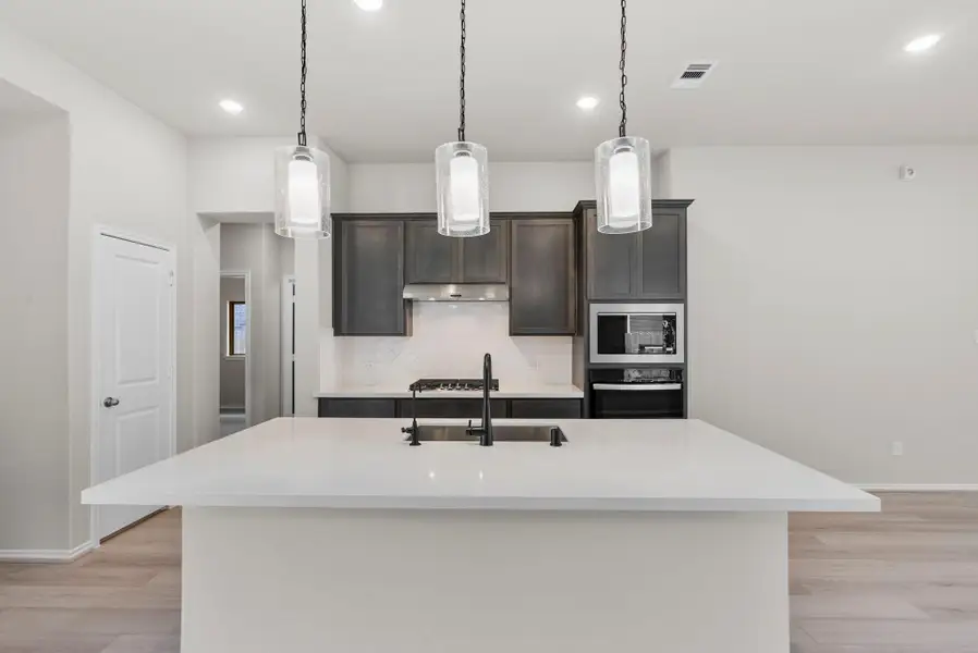 Furnished interior view inside a new home in Grand Central Park, Conroe (Image 6).