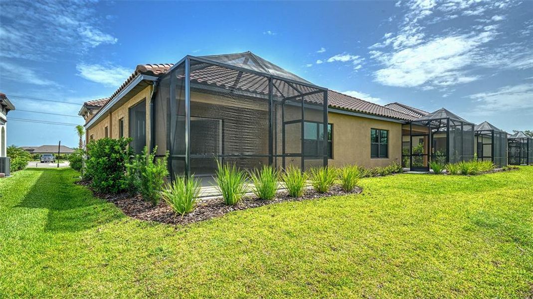 Exterior details and patio area of a home in Vicenza Real Estate and Homes for Sale in North Venice, FL - Neal Communities, Nokomis (Image 19).