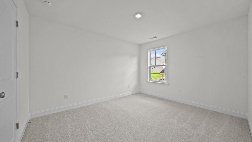 Furnished interior view inside a new home in Provisions at Courtland, Sanford (Image 17).
