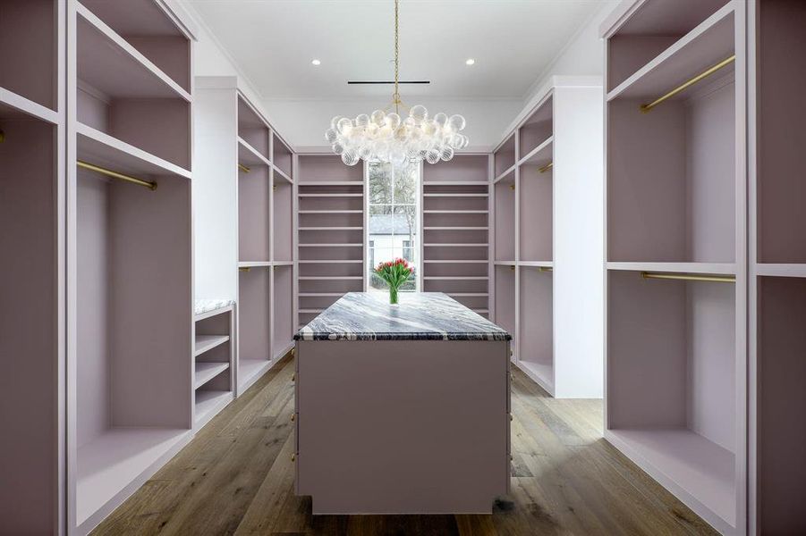 1 of 2 boutique style walk-in closets in Primary Suite