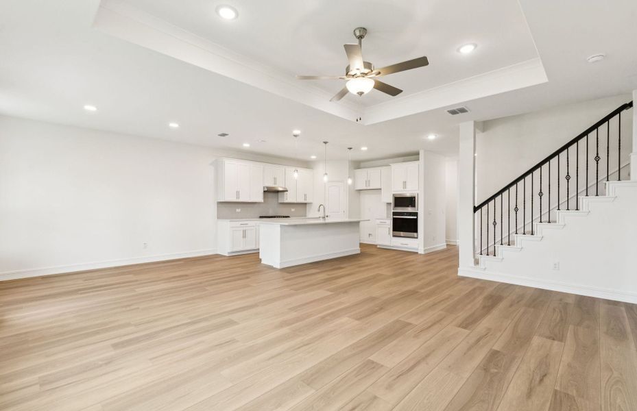 Bright and inviting gathering room perfect for entertaining  *Real home pictured