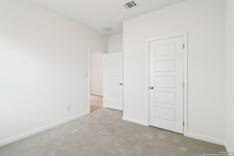 Spacious, unfurnished interior of a new home in Legendary Trails - Classic Series, Cibolo (Image 32).