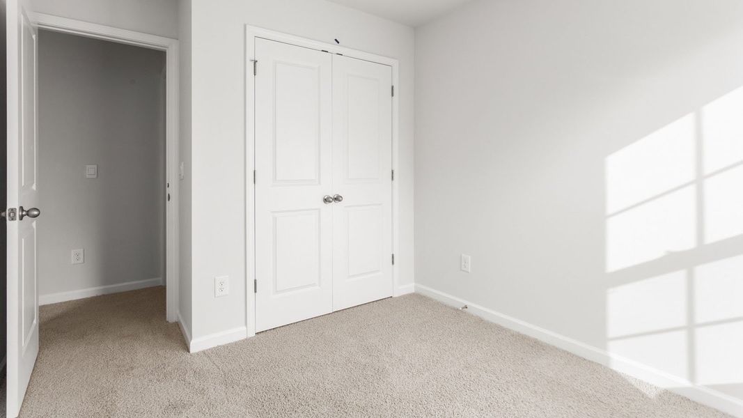 Representative unfurnished interior of a home built from the NEWTON - EXPRESS by D.R. Horton in Glennview, Kernersville (Image 17).