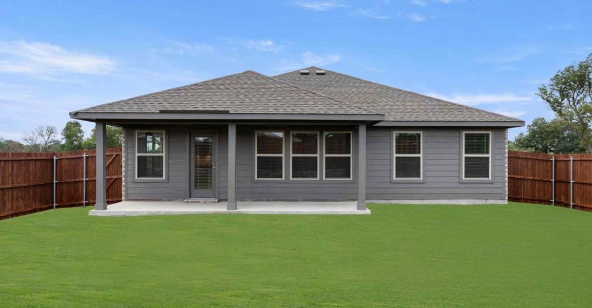 Representative exterior photo of a completed home built from the Atlanta by Impression Homes in Keeneland, Aubrey, TX (Image 25).