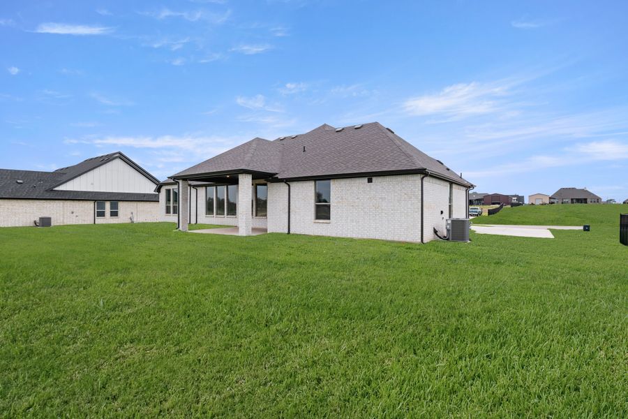Exterior details and patio area of a home in Paloma Ranch, New Fairview (Image 20).