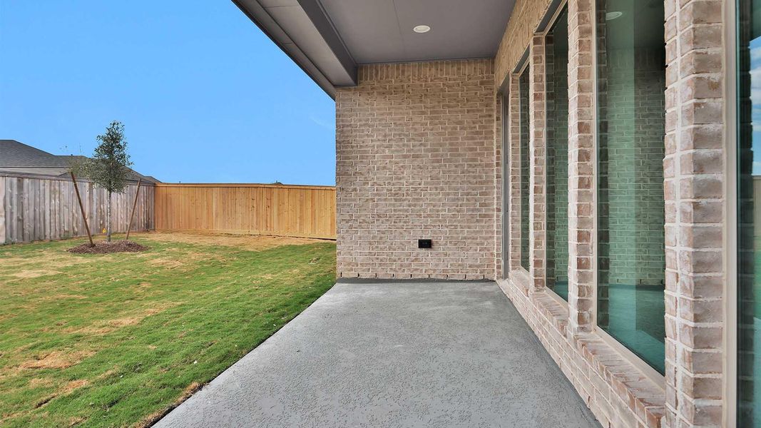 Exterior details and patio area of a home in Bridgeland, Cypress (Image 3).