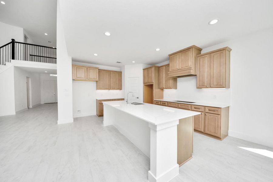 The extended counter area adds both practicality and style, making meal preparation a breeze. Every detail is thoughtfully designed to enhance the kitchen's functionality and aesthetic appeal. The extended counter area adds both practicality and style, making meal preparation a breeze. Every detail is thoughtfully designed to enhance the kitchen's functionality and aesthetic appeal.