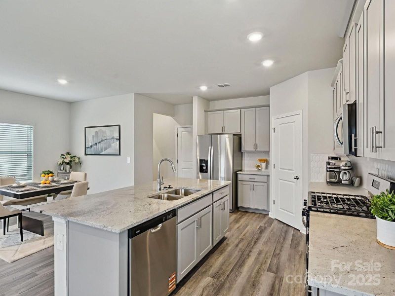 Photo is not of the actual home, but is an inspirational photo of builder’s model home and may depict options, furnishings, and/or decorator features that are not included