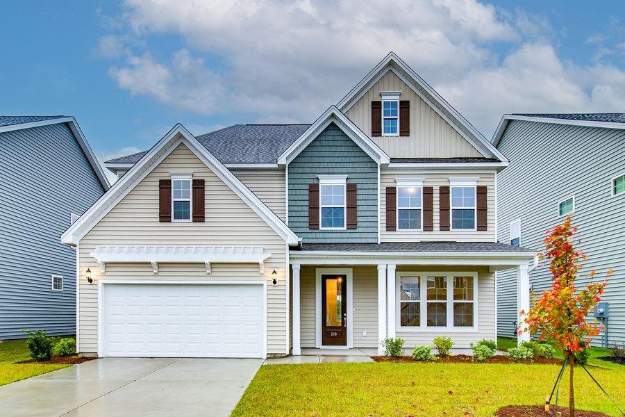 Front exterior of a new home in Hendrix Farms, Lexington, SC, highlighting curb appeal (Image 1). Front exterior of a new home in Hendrix Farms, Lexington, SC, highlighting curb appeal (Image 1).