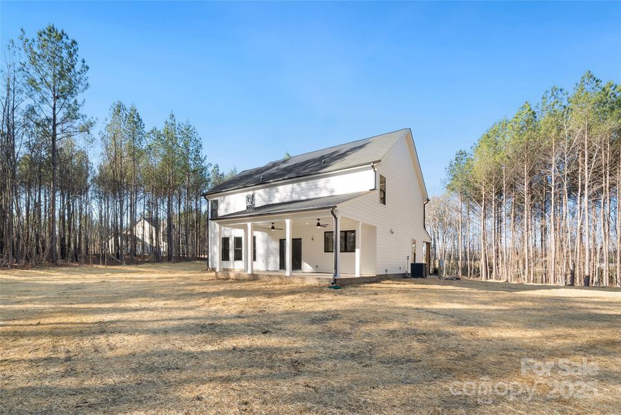 Exterior details and patio area of a home in , Wingate (Image 26).