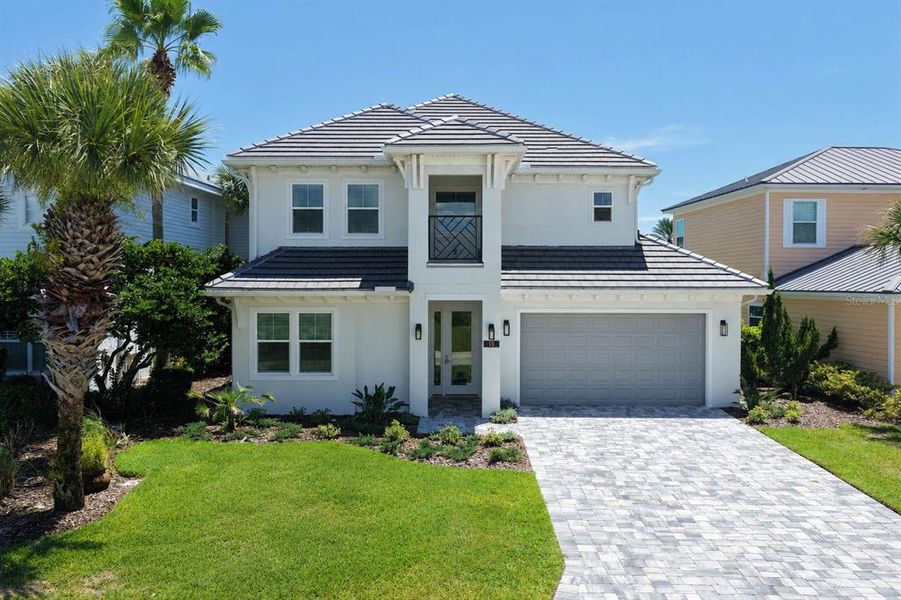 Front exterior of a new home in , Palm Coast, FL, highlighting curb appeal (Image 32). Front exterior of a new home in , Palm Coast, FL, highlighting curb appeal (Image 32).