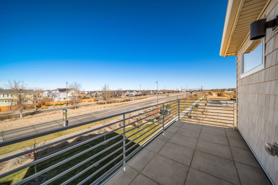 Exterior details and patio area of a home in Reunion, Commerce City (Image 23).