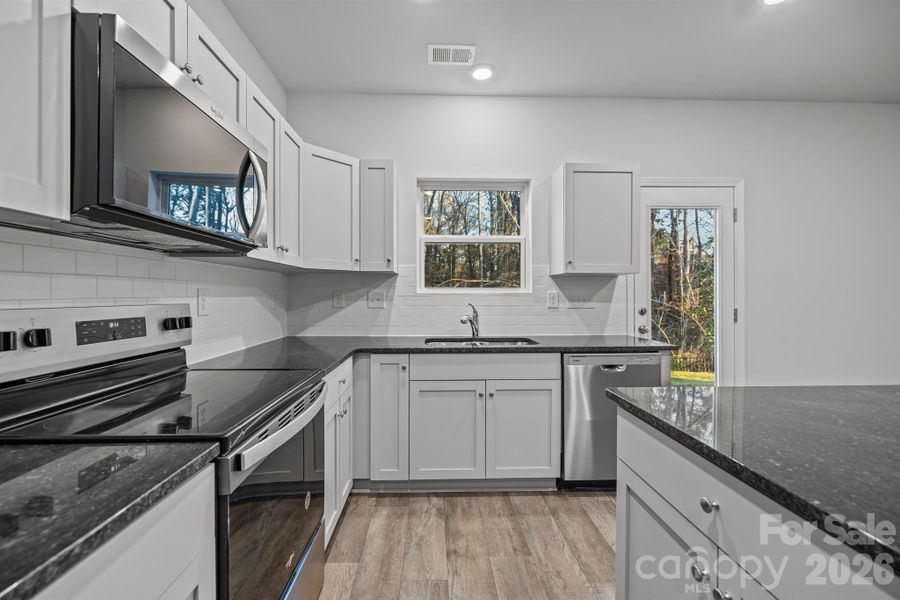 Furnished interior view inside a new home in Townes at Ribbon Walk, Charlotte (Image 9).