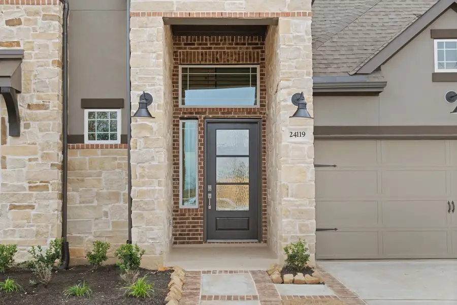 Representative exterior details of a home built from the Rivercrest by Chesmar Homes in Evergreen, Conroe (Image 3).