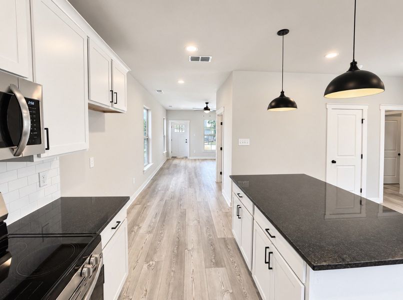 Furnished interior view inside a new home in Hickory Cove, Burns (Image 10).