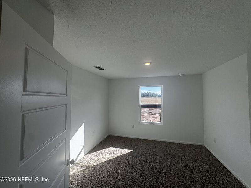 Spacious, unfurnished interior of a new home in The Arbors, Jacksonville (Image 23).