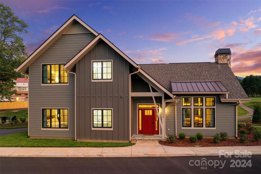 Front exterior of a new home in , Waynesville, NC, highlighting curb appeal (Image 1).
