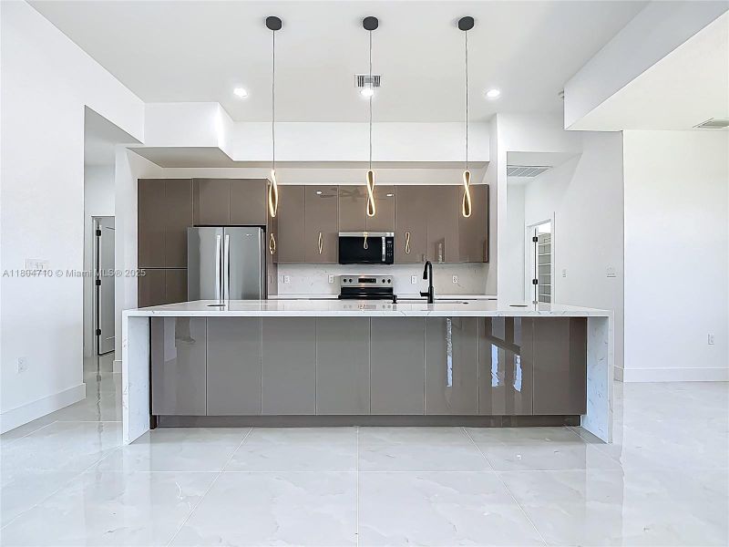 Furnished interior view inside a new home in , Cape Coral (Image 4). Furnished interior view inside a new home in , Cape Coral (Image 4).