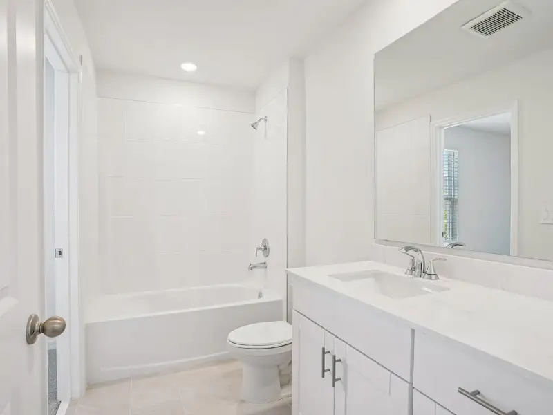 Furnished interior view inside a new home in The Meadow at Crossprairie Townes, St. Cloud (Image 6).