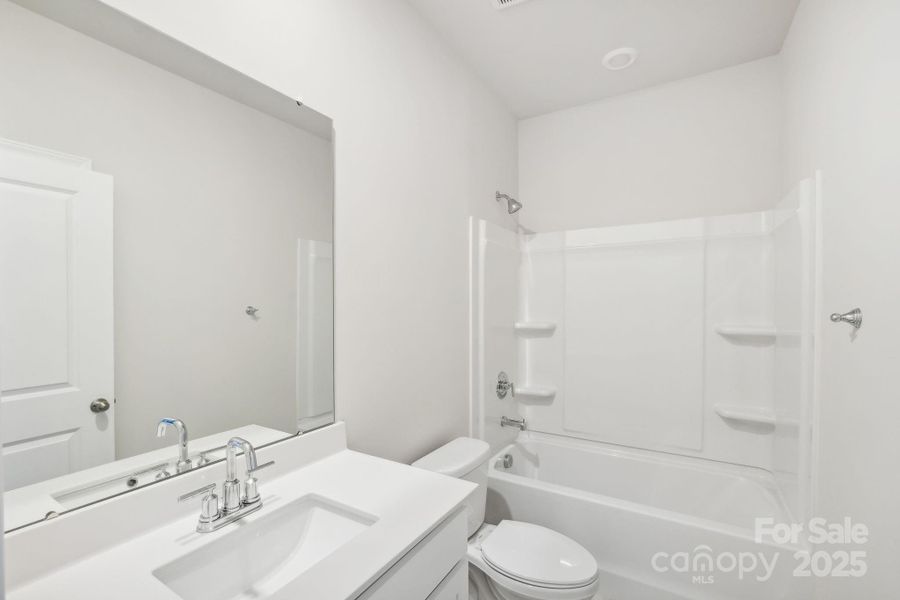 Furnished interior view inside a new home in Harper Landing, Stanley (Image 7).