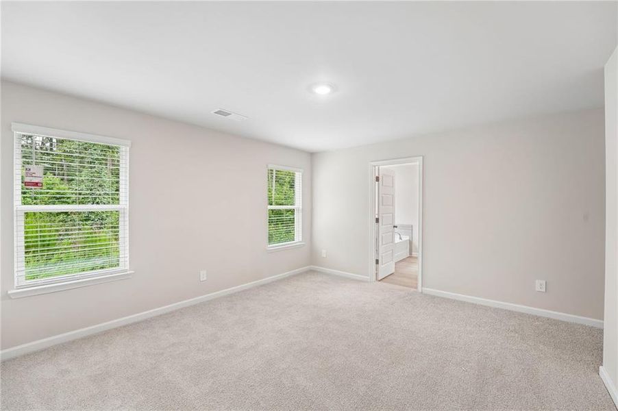 Spacious, unfurnished interior of a new home in Hemingway - Reserve Series, Cumming (Image 49). Spacious, unfurnished interior of a new home in Hemingway - Reserve Series, Cumming (Image 49).