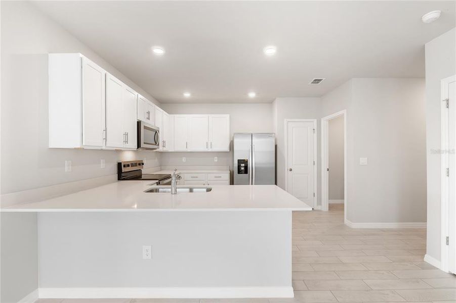 Furnished interior view inside a new home in Sea Cove, Punta Gorda (Image 6). Furnished interior view inside a new home in Sea Cove, Punta Gorda (Image 6).