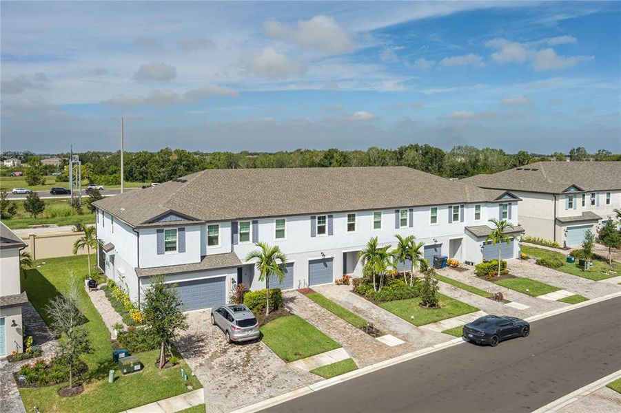 Front exterior of a new home in , Palmetto, FL, highlighting curb appeal (Image 23).