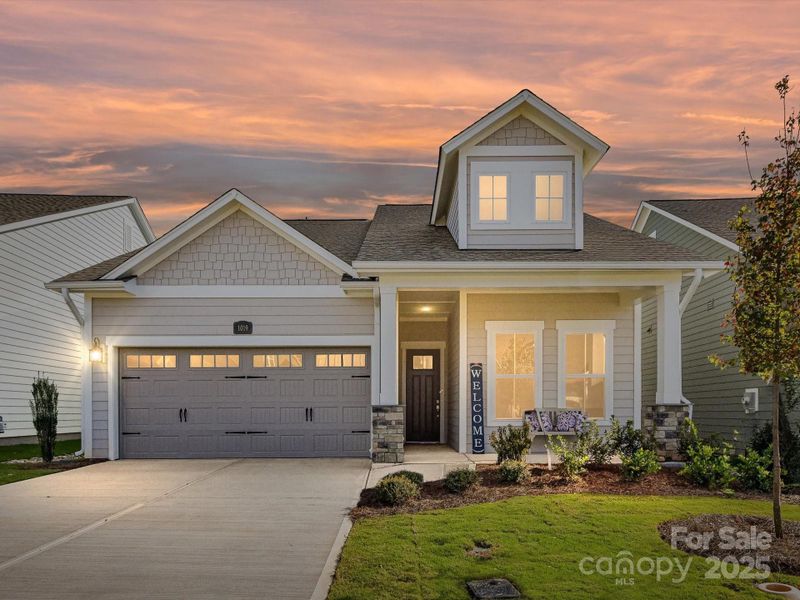Front exterior of a new home in Encore at Streamside - Classic Series, Waxhaw, NC, highlighting curb appeal (Image 24).