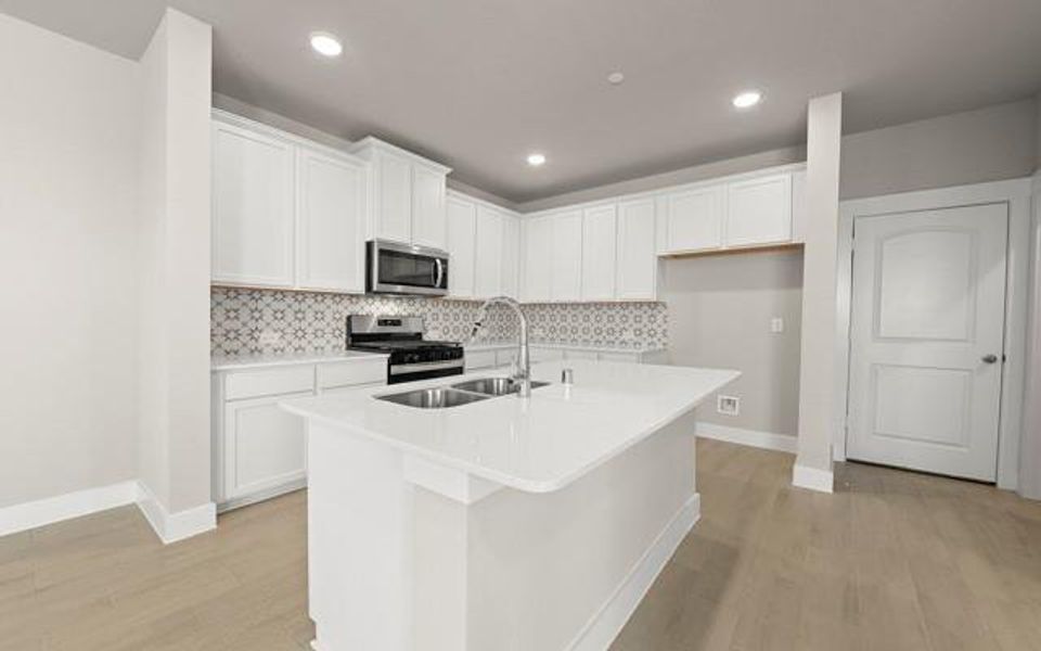 Not pictured is the tap screen refrigerator that is included in the home.