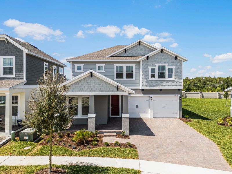 Representative exterior photo of a completed home built from the Frost by Rockwell Homes in Northlake at Ovation, Winter Garden, FL (Image 29). Representative exterior photo of a completed home built from the Frost by Rockwell Homes in Northlake at Ovation, Winter Garden, FL (Image 29).