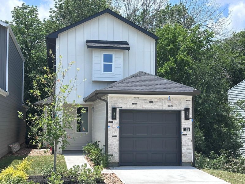 Front exterior of a new home in , Montgomery, TX, highlighting curb appeal (Image 5).