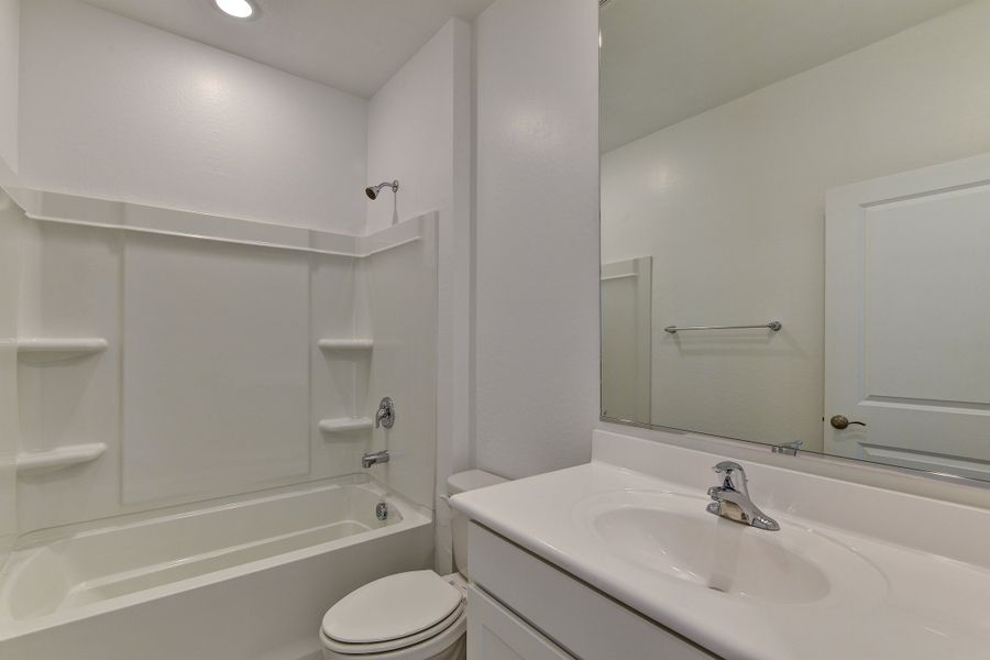 The Olive floorplans bathroom with spacious vanity.