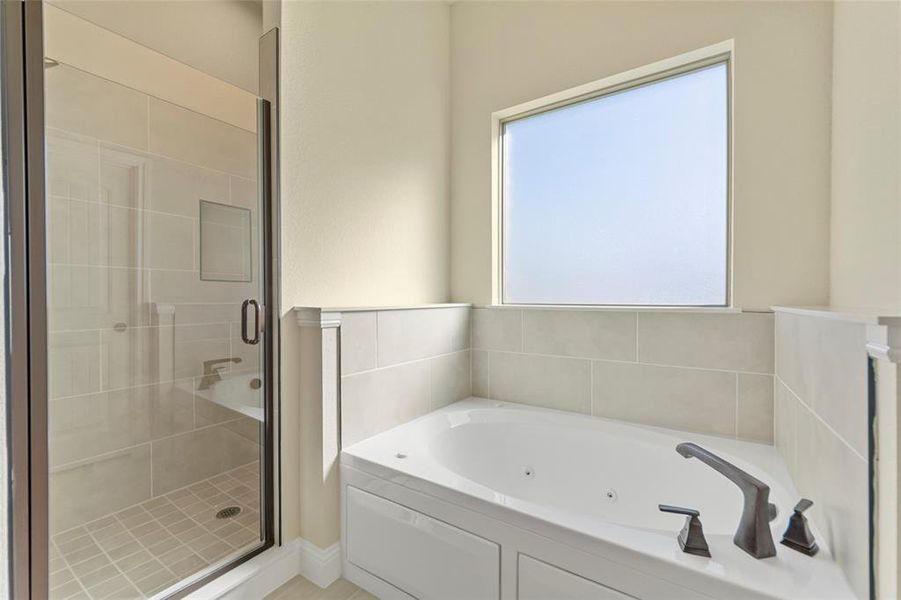 Bathroom with plus walk in shower