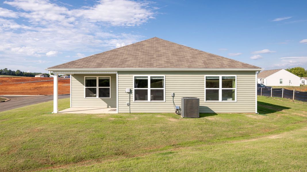 Exterior details and patio area of a home in Crescent Ridge, Niota (Image 3).