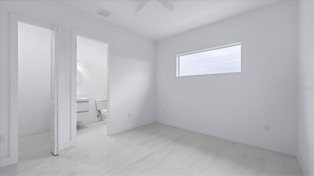 Spacious, unfurnished interior of a new home in , Port Charlotte (Image 37).