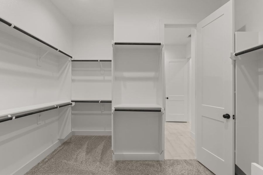 Representative furnished interior of a home built from the Sorenstam by Chesmar Homes in Riceland Alley Loads, Mont Belvieu (Image 52).