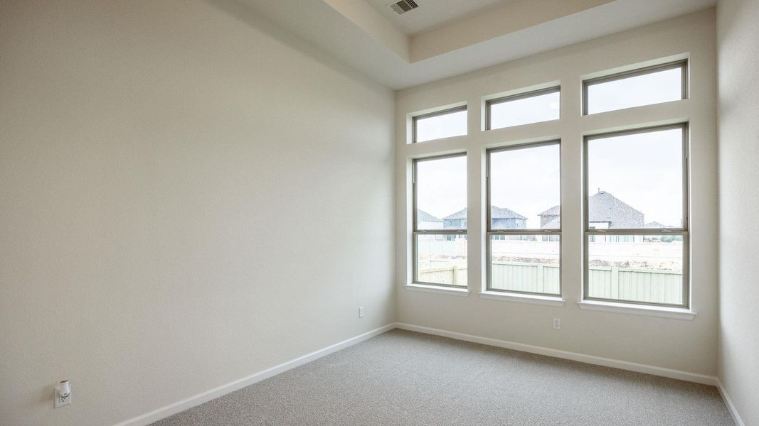 Spacious, unfurnished interior of a new home in Santa Rita Ranch - Tierra Rosa, Liberty Hill (Image 15).