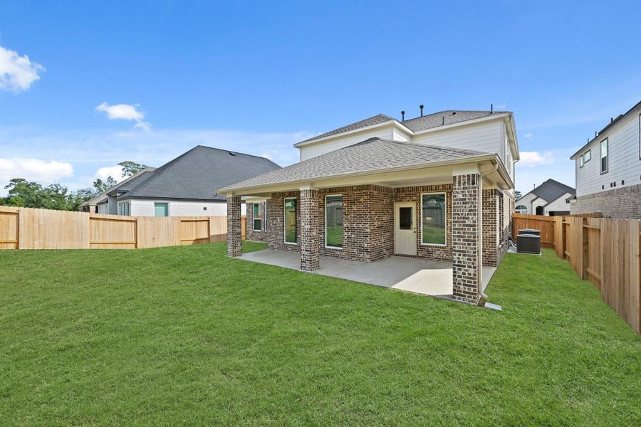 Exterior details and patio area of a home in Barton Creek Ranch, Conroe (Image 4). Exterior details and patio area of a home in Barton Creek Ranch, Conroe (Image 4).